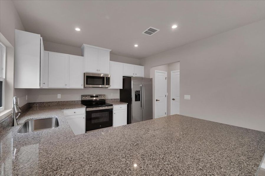 Furnished interior view inside a new home in Terra Lago, Indiantown (Image 4). Furnished interior view inside a new home in Terra Lago, Indiantown (Image 4).