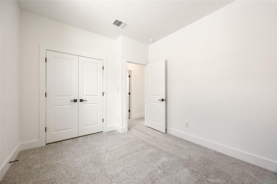 Spacious, unfurnished interior of a new home in Ryegrass Collection – Freedom at Anthem, Kyle (Image 13).