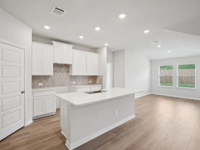 Kitchen in the Briscoe floorplan at a Meritage Homes community. Kitchen in the Briscoe floorplan at a Meritage Homes community.