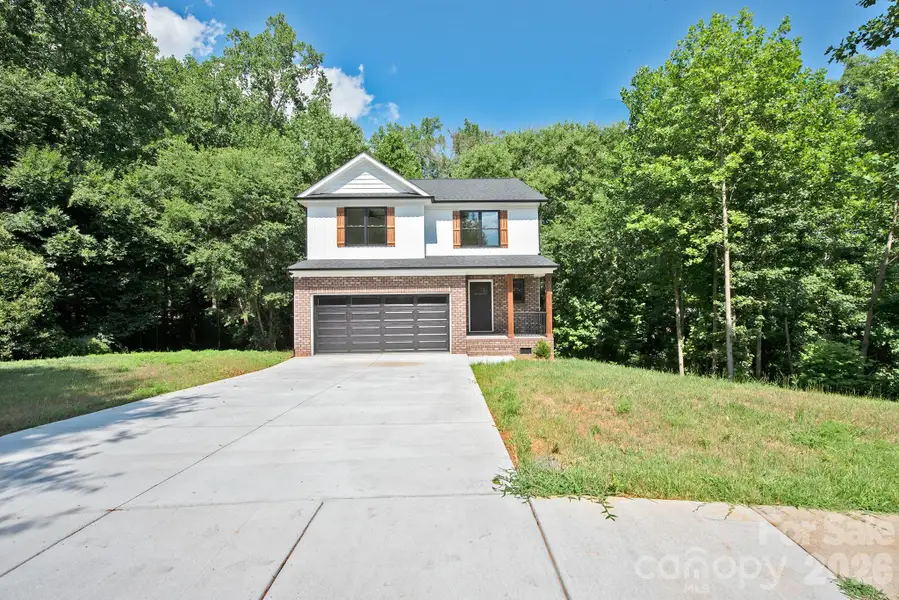 Front exterior of a new home in , Kannapolis, NC, highlighting curb appeal (Image 1). Front exterior of a new home in , Kannapolis, NC, highlighting curb appeal (Image 1).