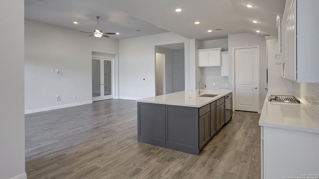 Furnished interior view inside a new home in Vida 50', San Antonio (Image 12).