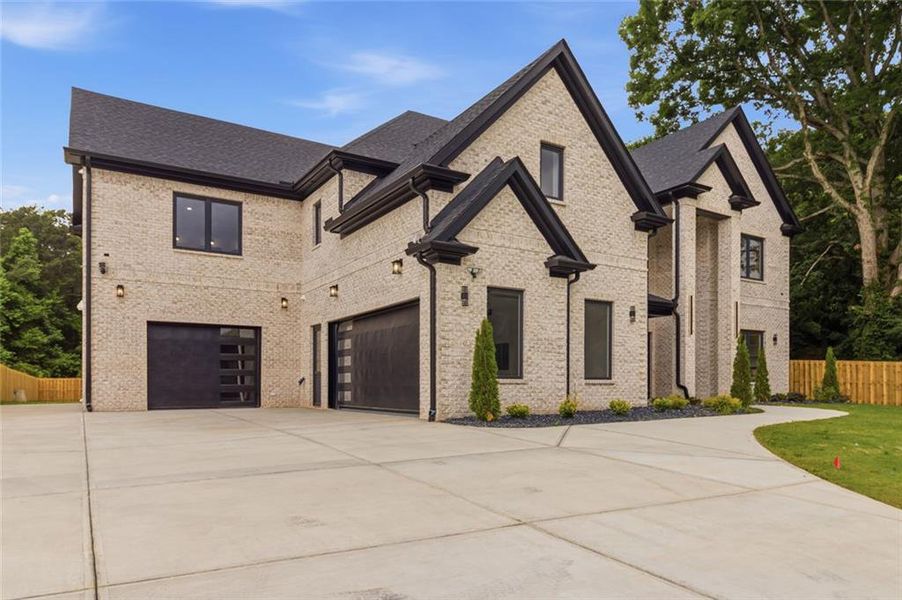 Front exterior of a new home in , Lawrenceville, GA, highlighting curb appeal (Image 6).