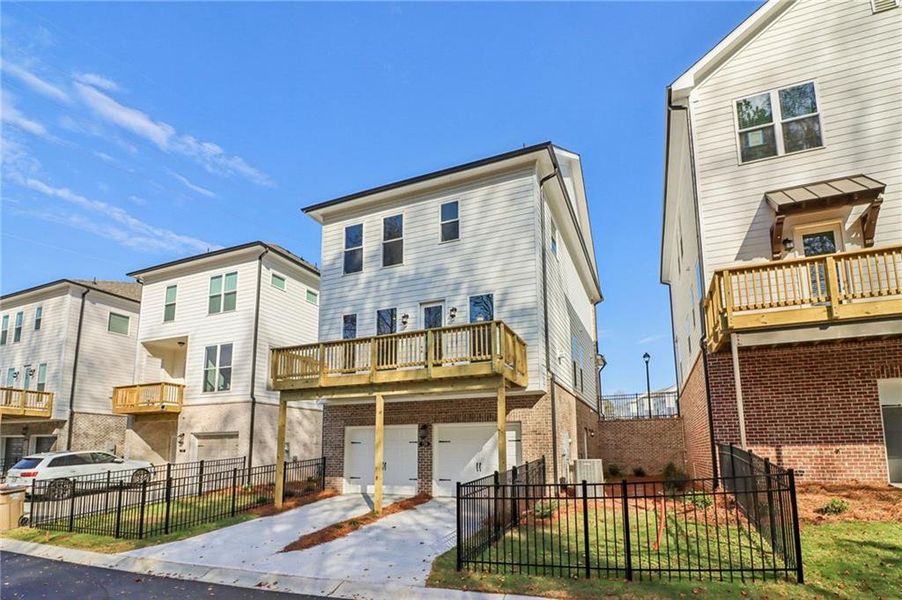 Exterior details and patio area of a home in Brackley Single Family, Cumming (Image 36). Exterior details and patio area of a home in Brackley Single Family, Cumming (Image 36).