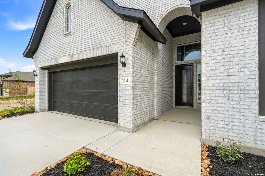 Exterior details and patio area of a home in Alsatian Oaks, Castroville (Image 28).