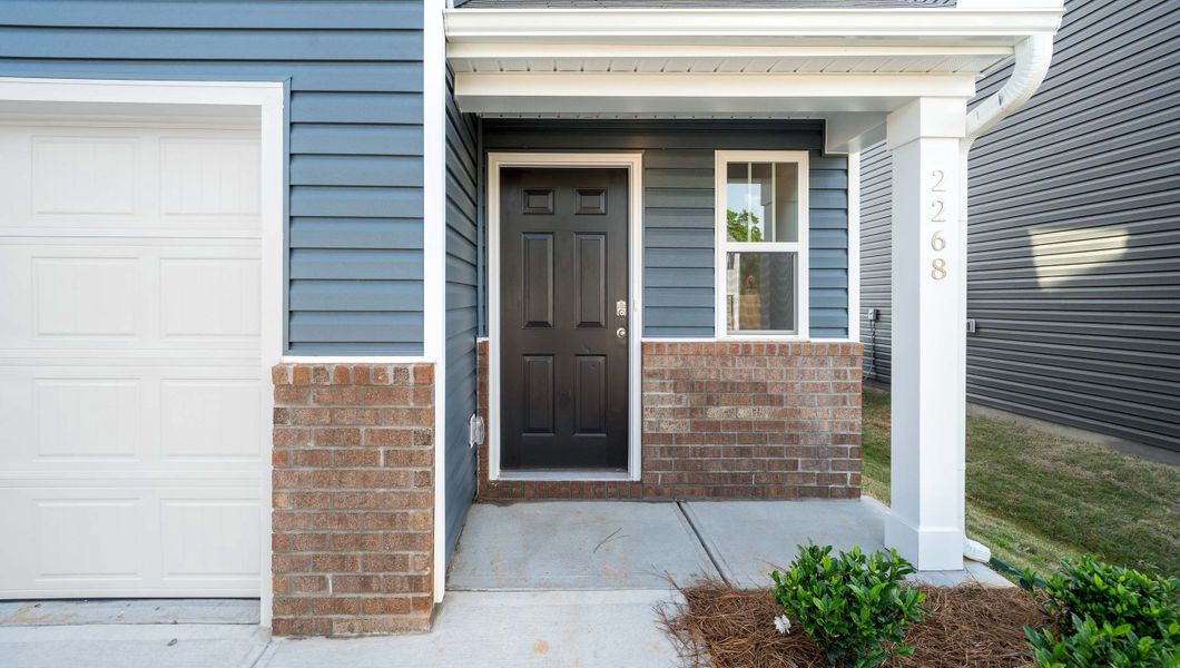 Exterior details and patio area of a home in Durbin Meadows, Fountain Inn (Image 2). Exterior details and patio area of a home in Durbin Meadows, Fountain Inn (Image 2).
