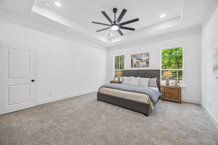 The primary bedroom is a great size.