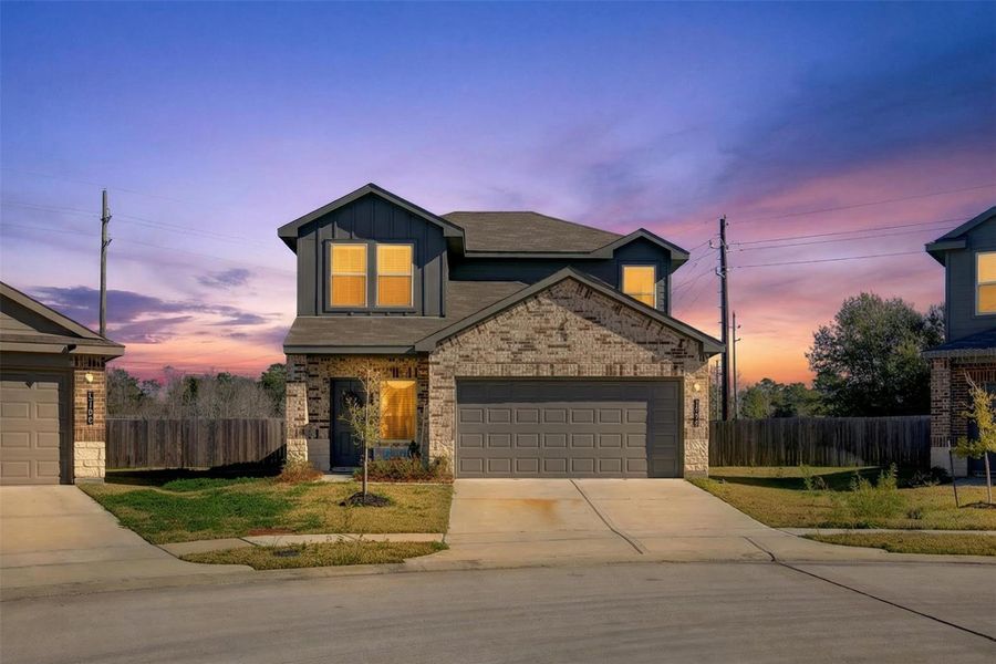 Front exterior of a new home in , Houston, TX, highlighting curb appeal (Image 24).