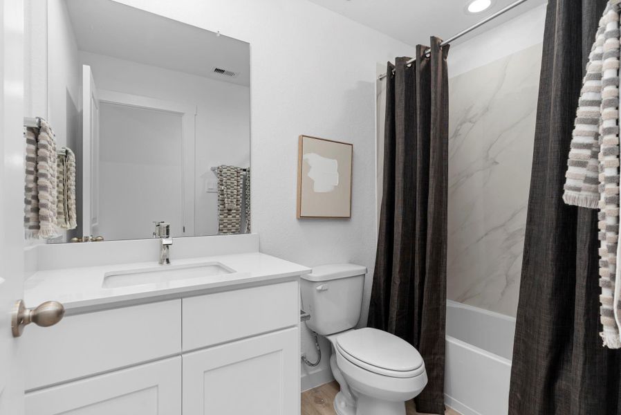 Furnished interior view inside a new home in Blue Heron Estates, Beasley (Image 11).