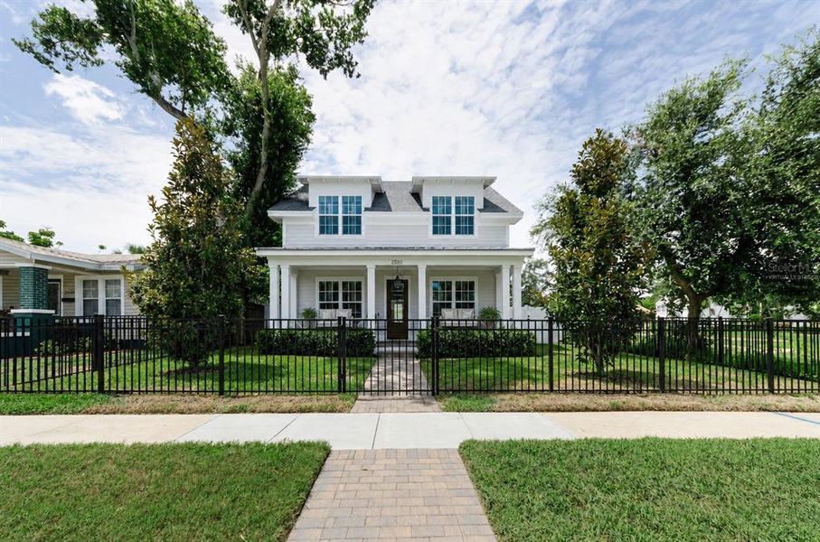 Front exterior of a new home in , St. Petersburg, FL, highlighting curb appeal (Image 1). Front exterior of a new home in , St. Petersburg, FL, highlighting curb appeal (Image 1).