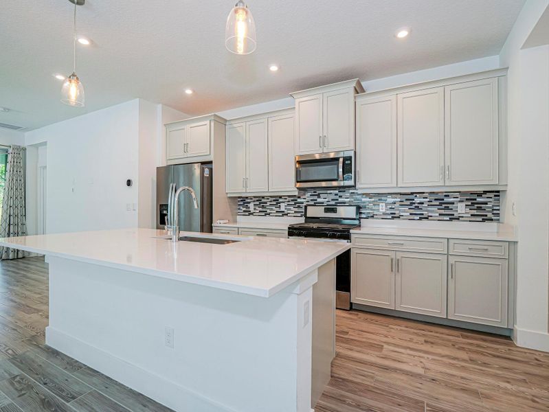 Furnished interior view inside a new home in , Port St. Lucie (Image 13).