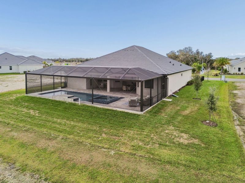 Exterior details and patio area of a home in River Preserve Estates, Parrish (Image 48).