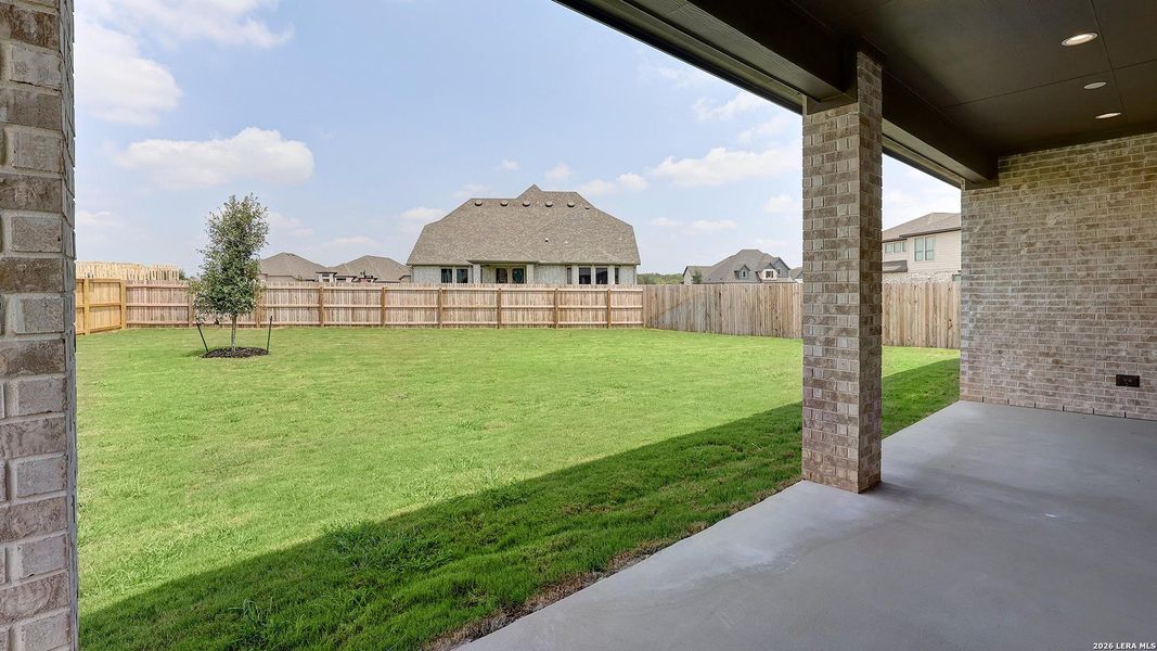 Exterior details and patio area of a home in Alsatian Oaks, Castroville (Image 3).