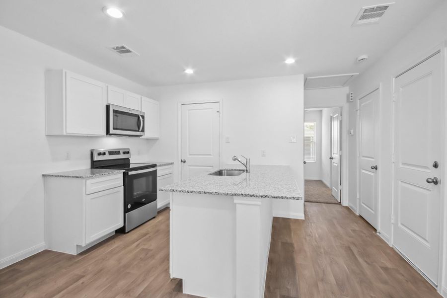 Furnished interior view inside a new home in William Trails, Willis (Image 4). Furnished interior view inside a new home in William Trails, Willis (Image 4).