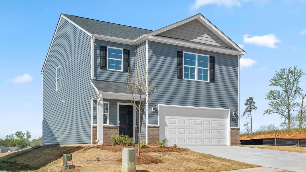 Front exterior of a new home in Fishel Village, Winston-Salem, NC, highlighting curb appeal (Image 13).