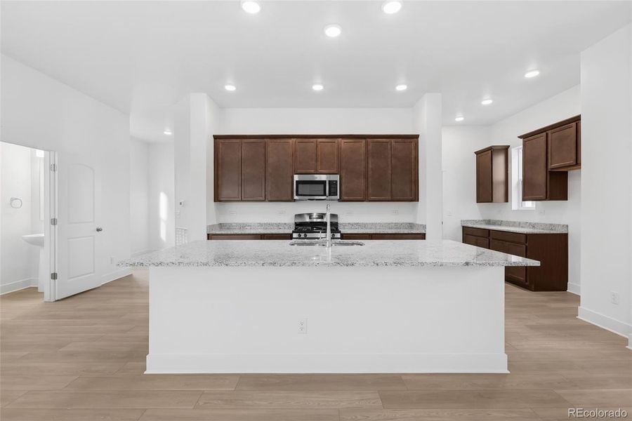 Furnished interior view inside a new home in Painted Prairie Cottage, Aurora (Image 8).
