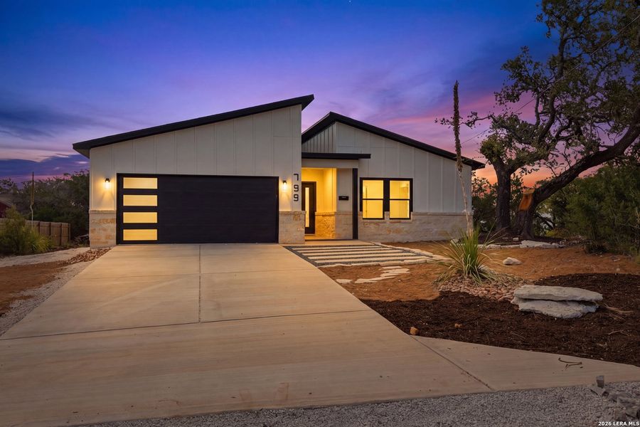 Front exterior of a new home in , Spring Branch, TX, highlighting curb appeal (Image 22).