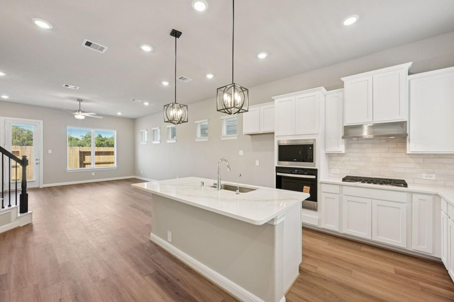 Furnished interior view inside a new home in Kemah Crossing - Luxe Series, Kemah (Image 10). Furnished interior view inside a new home in Kemah Crossing - Luxe Series, Kemah (Image 10).