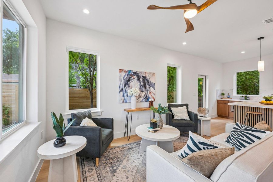 Natural light pours into this living space, highlighting clean lines. Natural light pours into this living space, highlighting clean lines.
