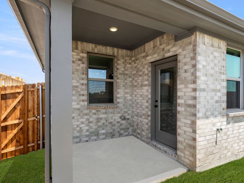 Exterior details and patio area of a home in Mercer Meadows, Royse City (Image 3).
