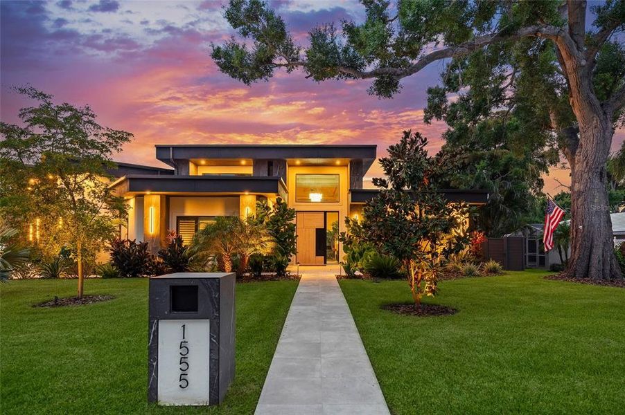 Front exterior of a new home in , Sarasota, FL, highlighting curb appeal (Image 22). Front exterior of a new home in , Sarasota, FL, highlighting curb appeal (Image 22).