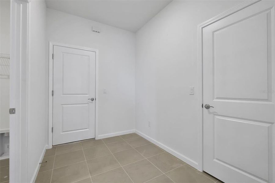 Spacious, unfurnished interior of a new home in Brystol North at Wylder, Port St. Lucie (Image 16).