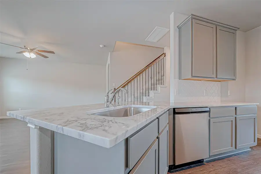 Furnished interior view inside a new home in Mill Creek Trails, Magnolia (Image 6).