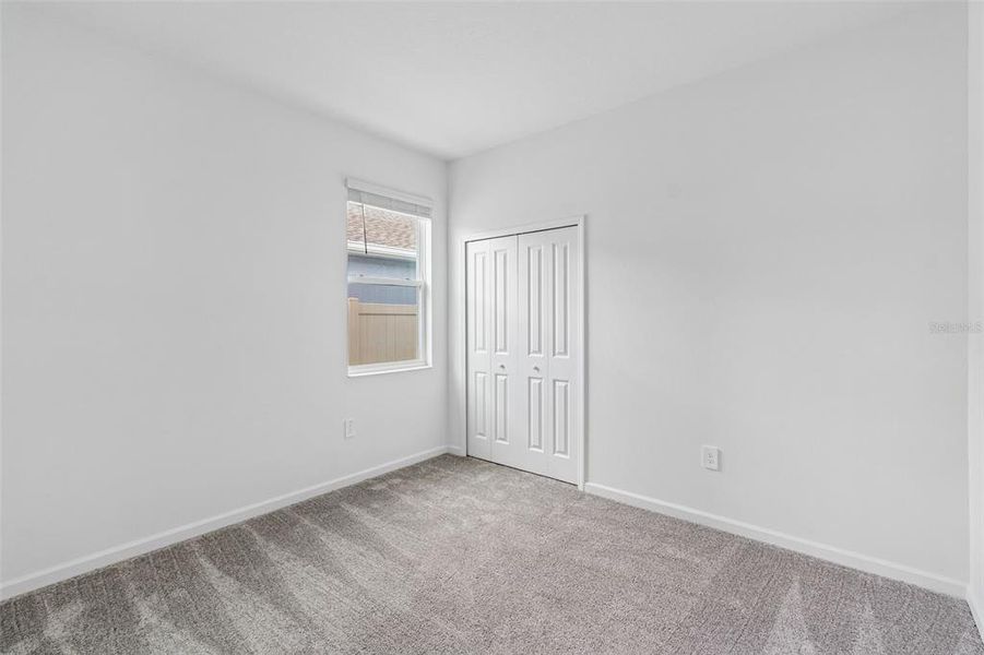 Spacious, unfurnished interior of a new home in Peace Creek Reserve, Winter Haven (Image 22).