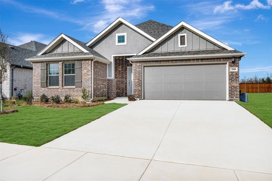 Front exterior of a new home in Sagebrook, Argyle, TX, highlighting curb appeal (Image 2). Front exterior of a new home in Sagebrook, Argyle, TX, highlighting curb appeal (Image 2).