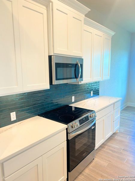 Furnished interior view inside a new home in , La Vernia (Image 31). Furnished interior view inside a new home in , La Vernia (Image 31).