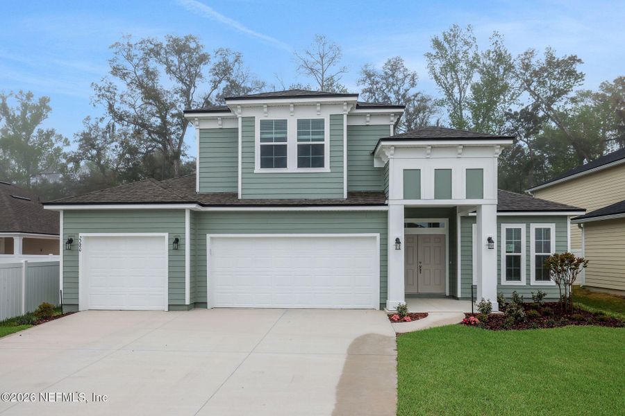 Front exterior of a new home in Jennings Farm, Middleburg, FL, highlighting curb appeal (Image 24). Front exterior of a new home in Jennings Farm, Middleburg, FL, highlighting curb appeal (Image 24).
