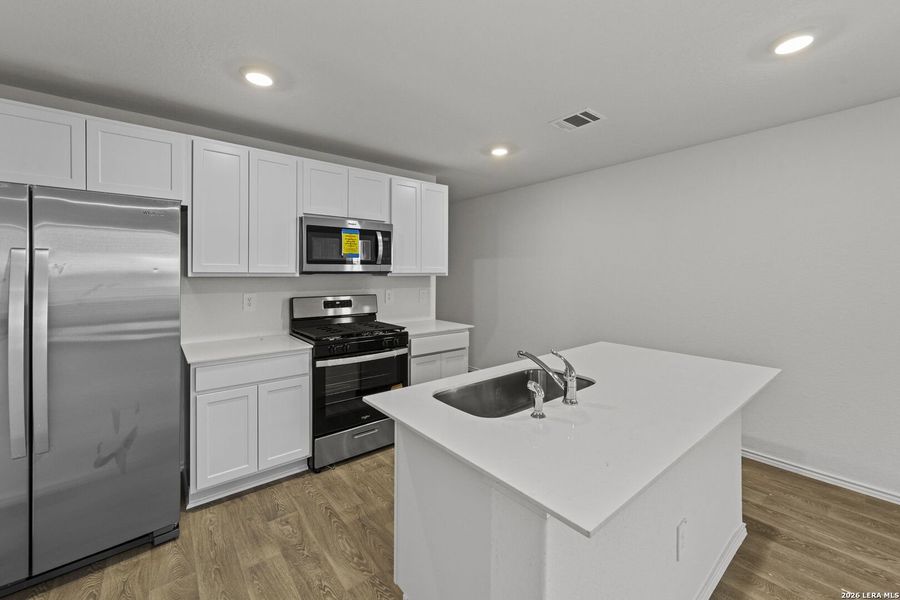 Furnished interior view inside a new home in Hickory Ridge, Elmendorf (Image 9).