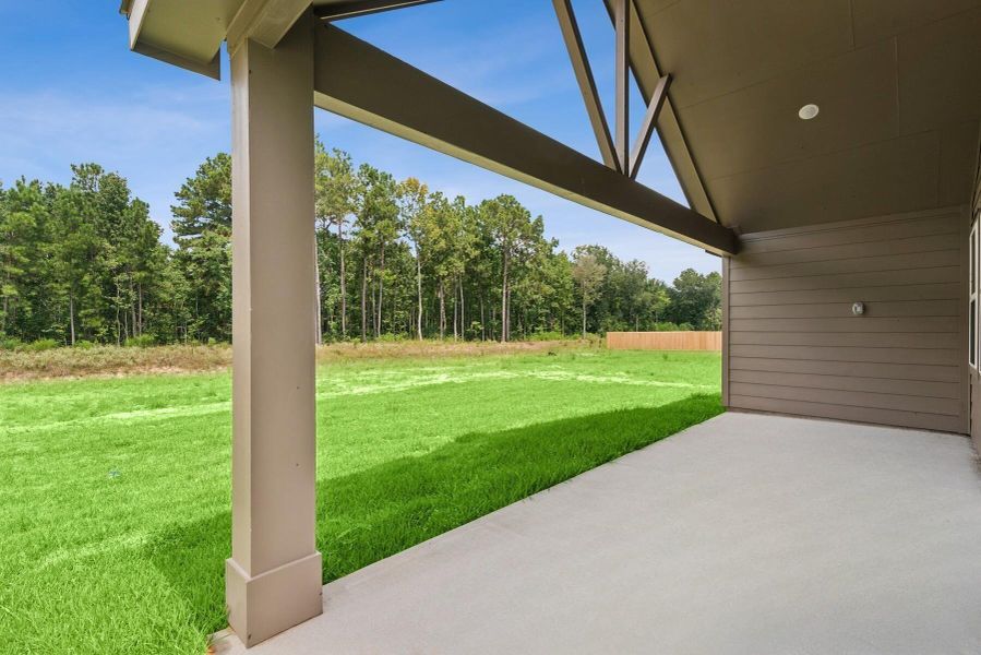 Exterior details and patio area of a home in Tarkington Timbers, Cleveland (Image 2). Exterior details and patio area of a home in Tarkington Timbers, Cleveland (Image 2).