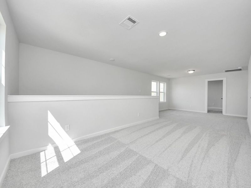Spacious, unfurnished interior of a new home in Sunterra, Katy (Image 25).