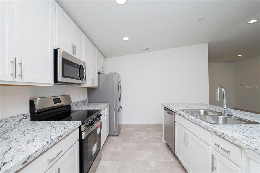 Furnished interior view inside a new home in , Lake Wales (Image 6).