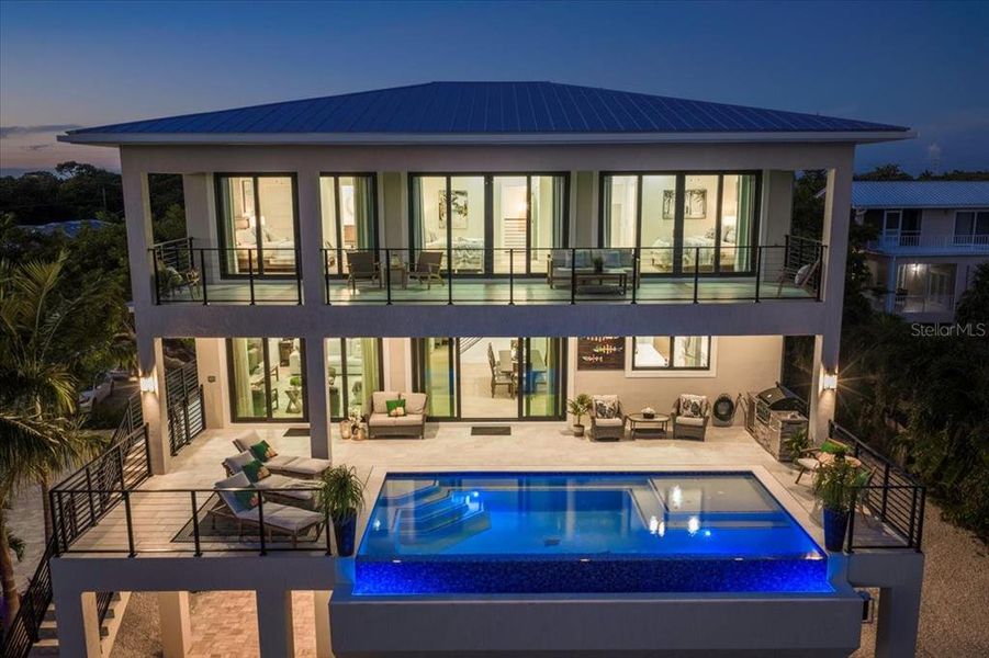 Front exterior of a new home in , Marathon, FL, highlighting curb appeal (Image 1). Front exterior of a new home in , Marathon, FL, highlighting curb appeal (Image 1).