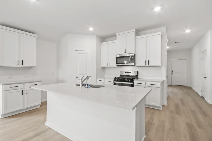 Furnished interior view inside a new home in Harrington Trails at The Canopies, Splendora (Image 5).