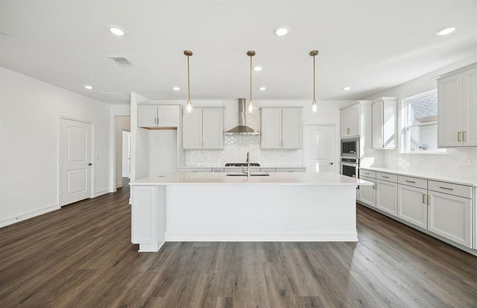 Pendant lighting over island