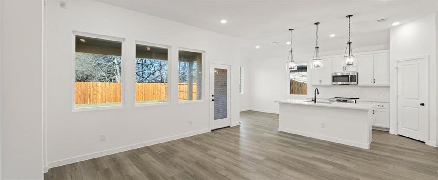 Open Kitchen-Living-Dining Room featuring the Harmony Collection