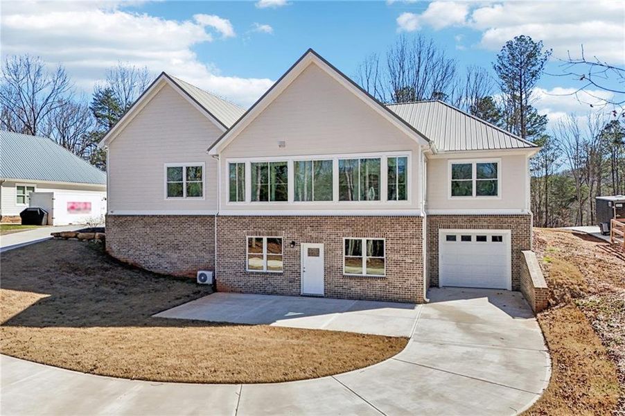 Front exterior of a new home in , Canton, GA, highlighting curb appeal (Image 29).