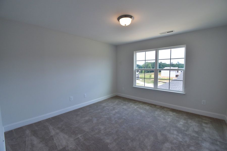 Representative unfurnished interior of a home built from the Ellerbe by Keystone Homes NC in Sullivans Reserve, Walkertown (Image 32).