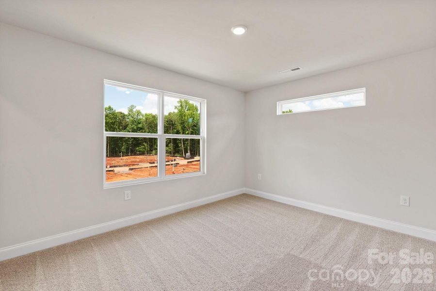 Spacious, unfurnished interior of a new home in Ascot Woods, Charlotte (Image 16).