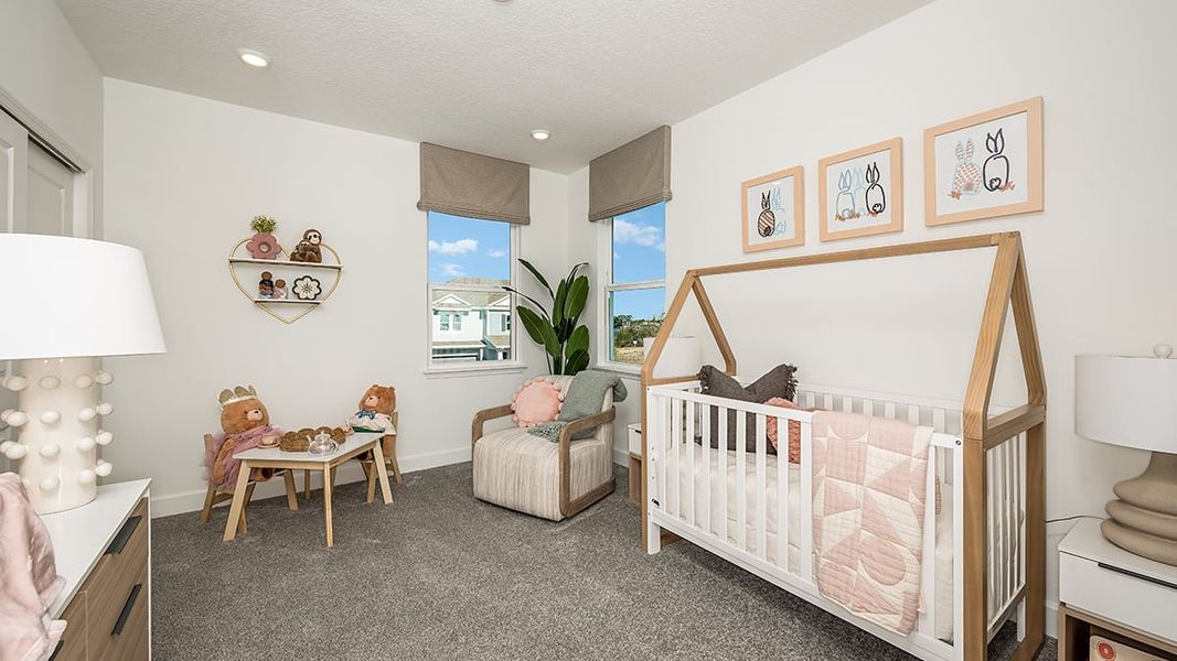 Representative furnished interior of a home built from the Anastasia by Taylor Morrison in Lochside, Mount Dora (Image 26).