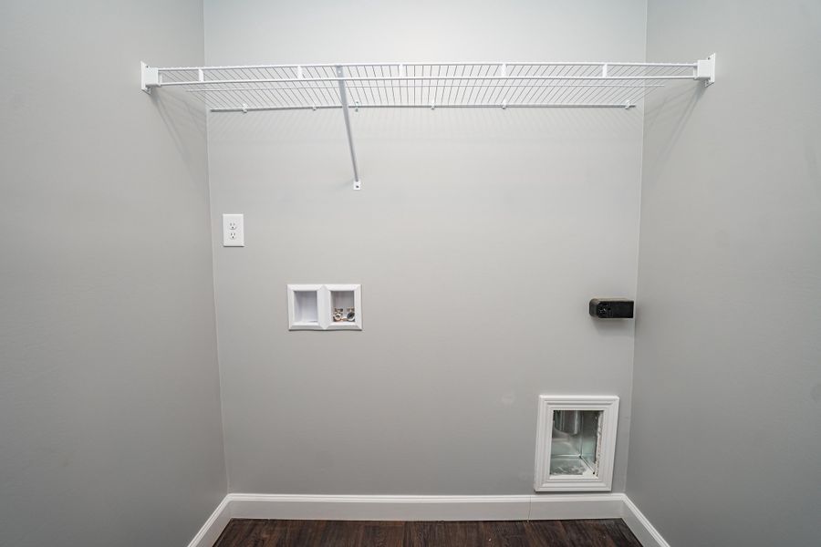 Representative unfurnished interior of a home built from the Saxon by Enchanted Homes in Guadalupe Heights, Seguin (Image 22).