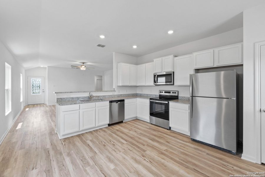 Furnished interior view inside a new home in Blue Wing, San Antonio (Image 8). Furnished interior view inside a new home in Blue Wing, San Antonio (Image 8).