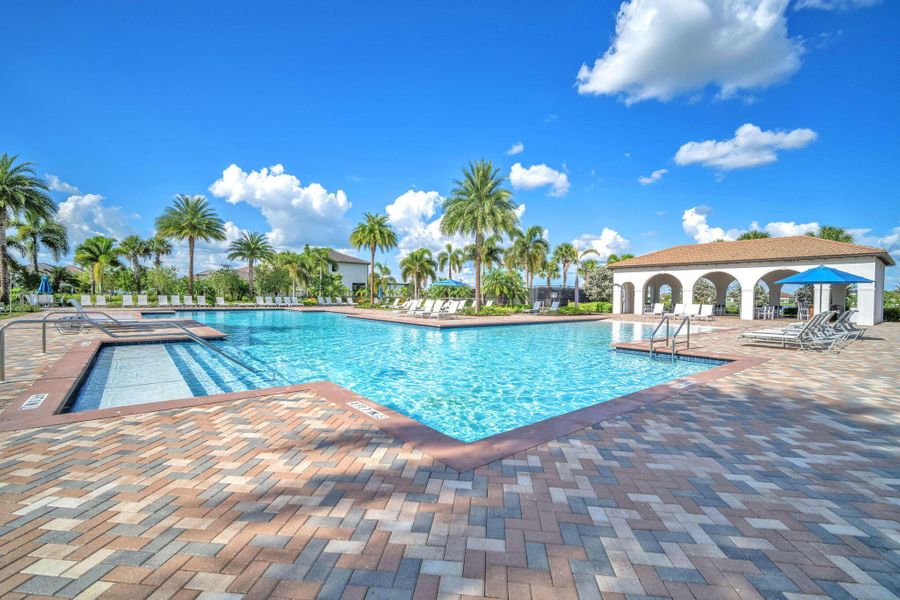 Front exterior of a new home in , Ave Maria, FL, highlighting curb appeal (Image 26).
