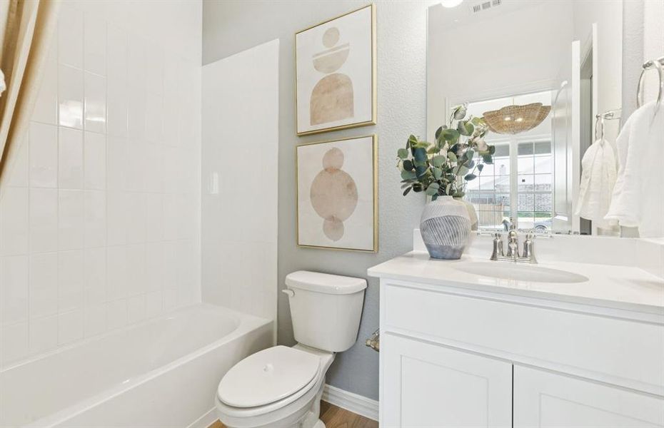 Spacious secondary bathroom *Model Representation*