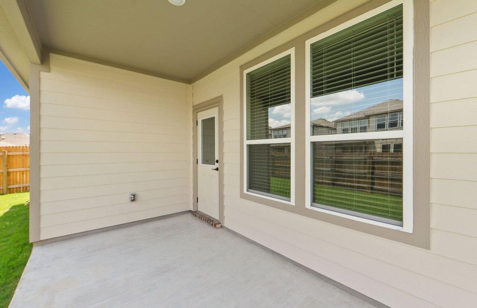 Exterior details and patio area of a home in Crosswinds, Kyle (Image 18).