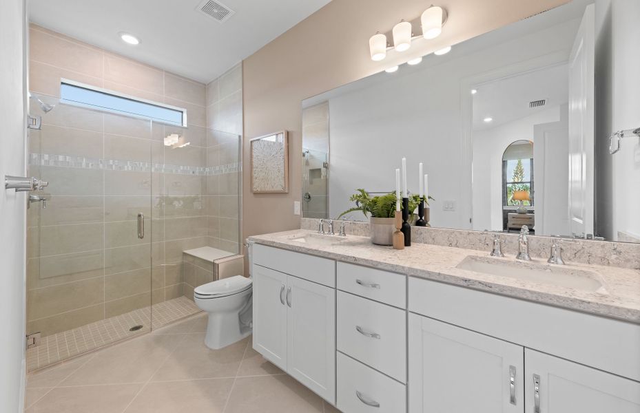 Furnished interior view inside a new home in Del Webb Naples, Ave Maria (Image 12).