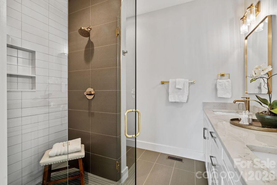 Walk-In Shower in the Primary Suite Walk-In Shower in the Primary Suite
