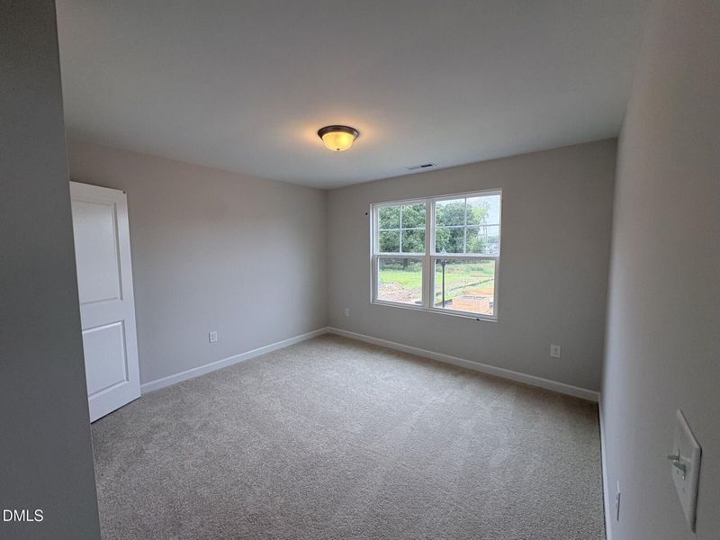 Spacious, unfurnished interior of a new home in Woodland Crossing, Zebulon (Image 18).